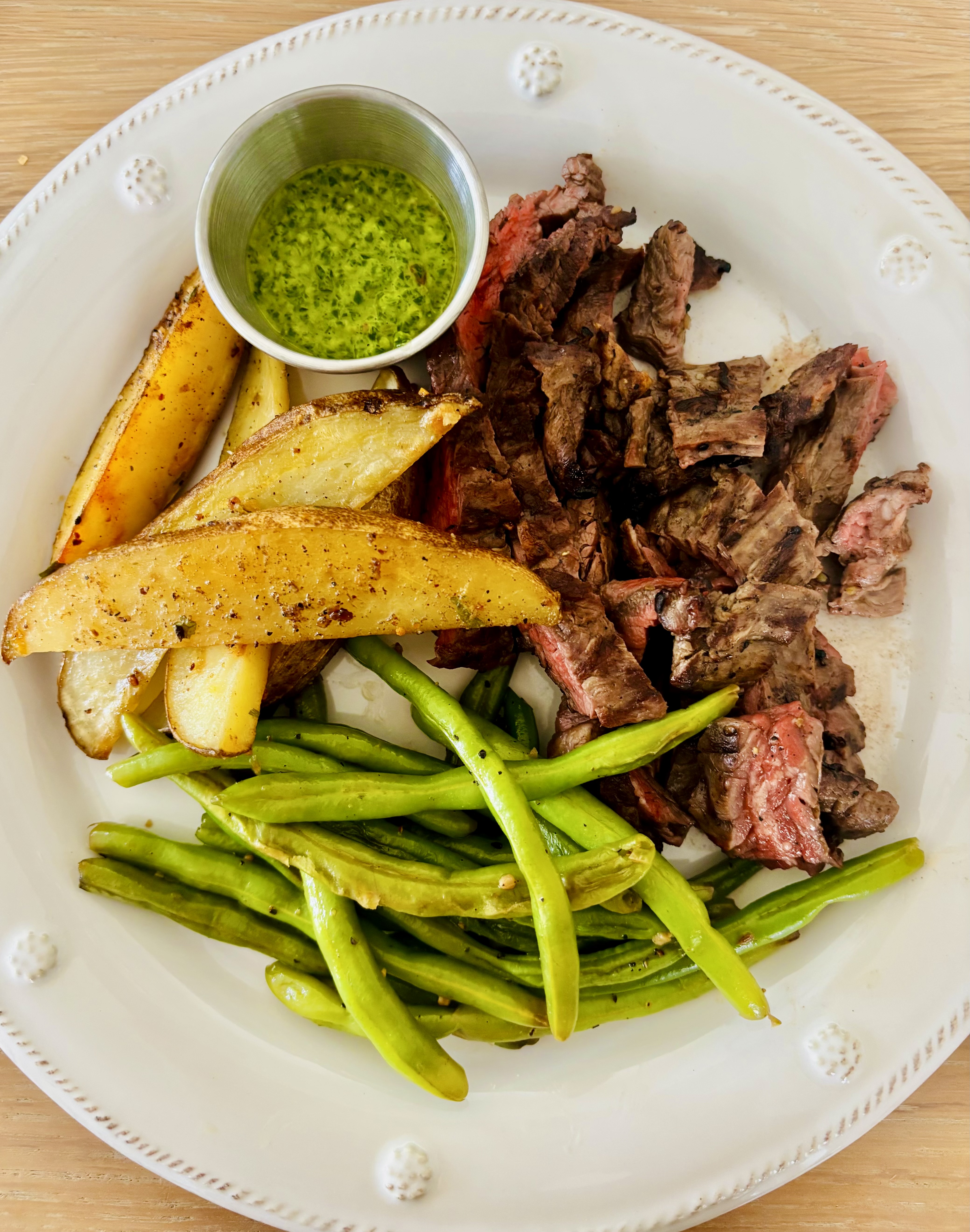 Steak with chimichurri and green beans
