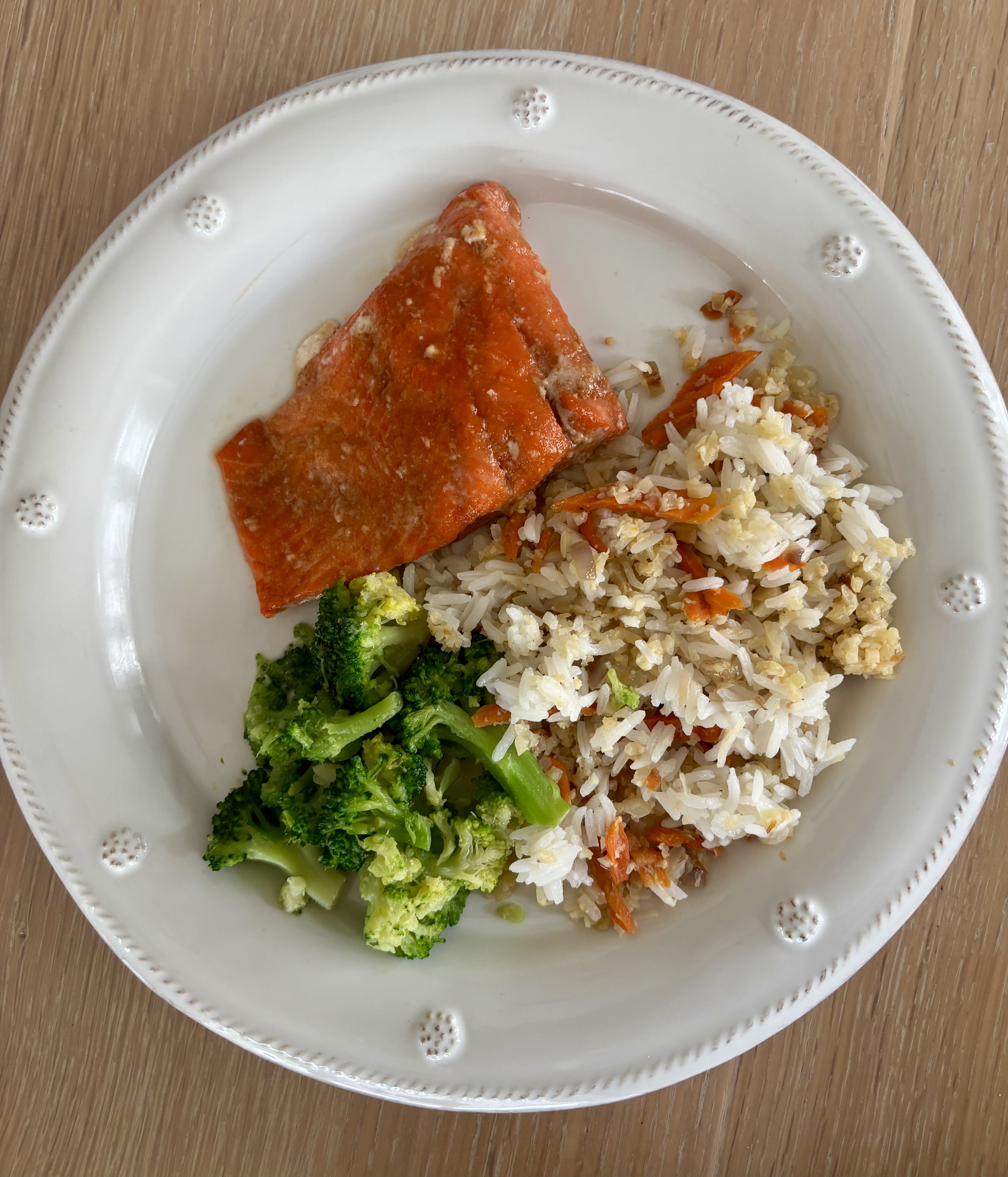 Glazed salmon with fried rice and broccoli